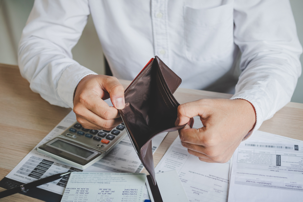 problem business person man, male holding and open an empty wallet not have money