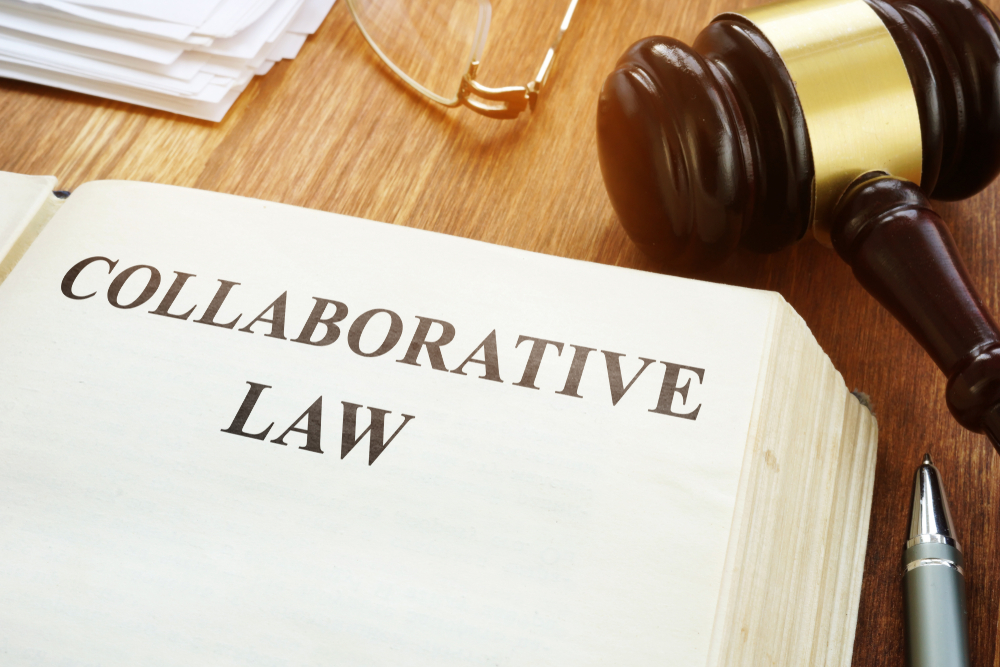 Collaborative law book, gavel and papers